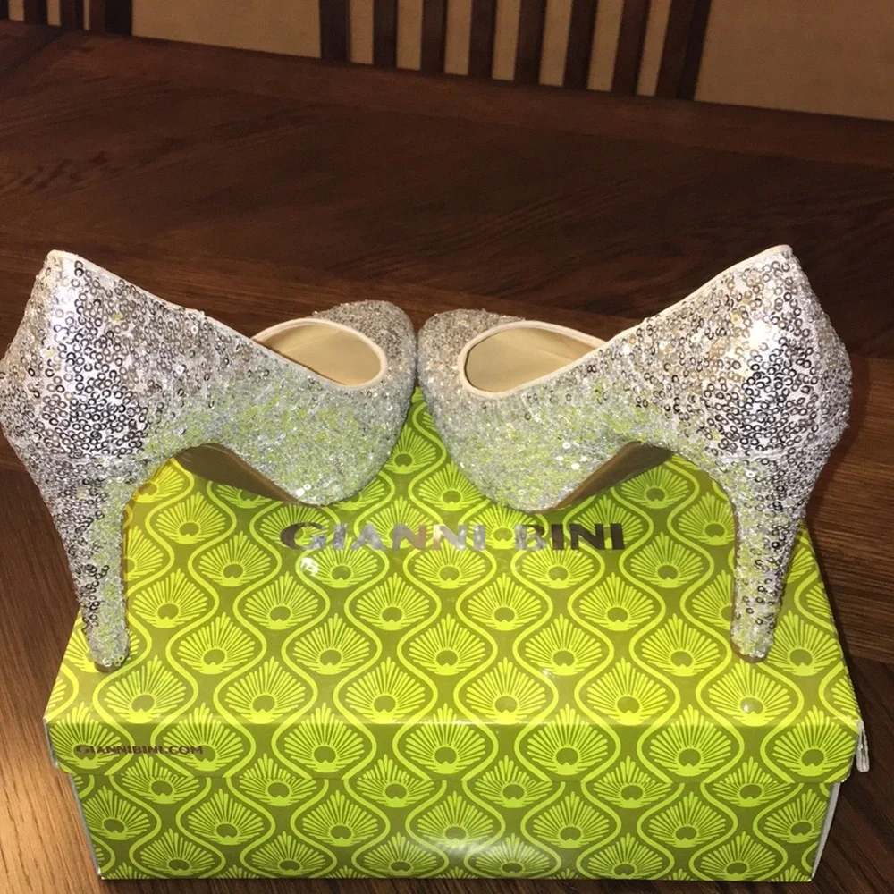 Trending, glam- high heels- Gianni Bini; Silver Heels; 8.5